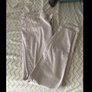 Khaki color skinny jeans.